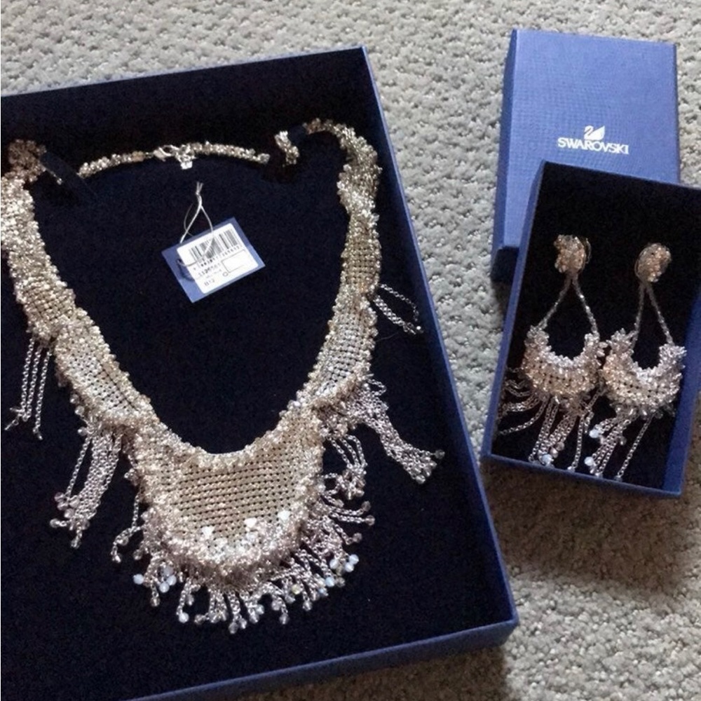 Authentic Swarovski extravagant Long Necklace with Matching earrings. $1900